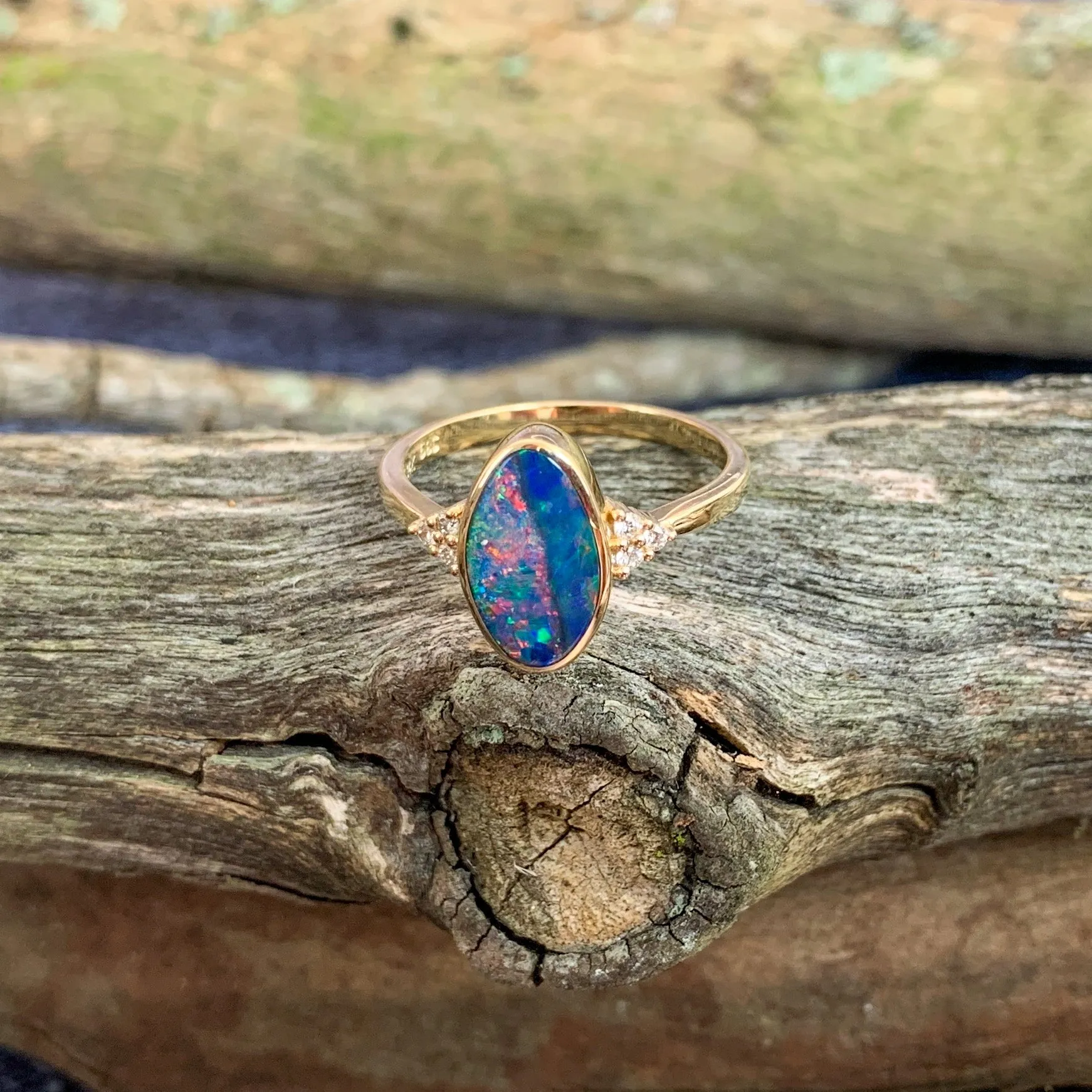 14kt Yellow Gold Oval freeform Red and Green Opal doublet with diamonds ring