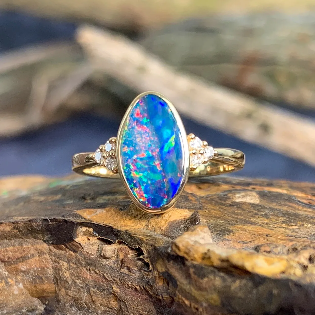 14kt Yellow Gold Oval freeform Red and Green Opal doublet with diamonds ring