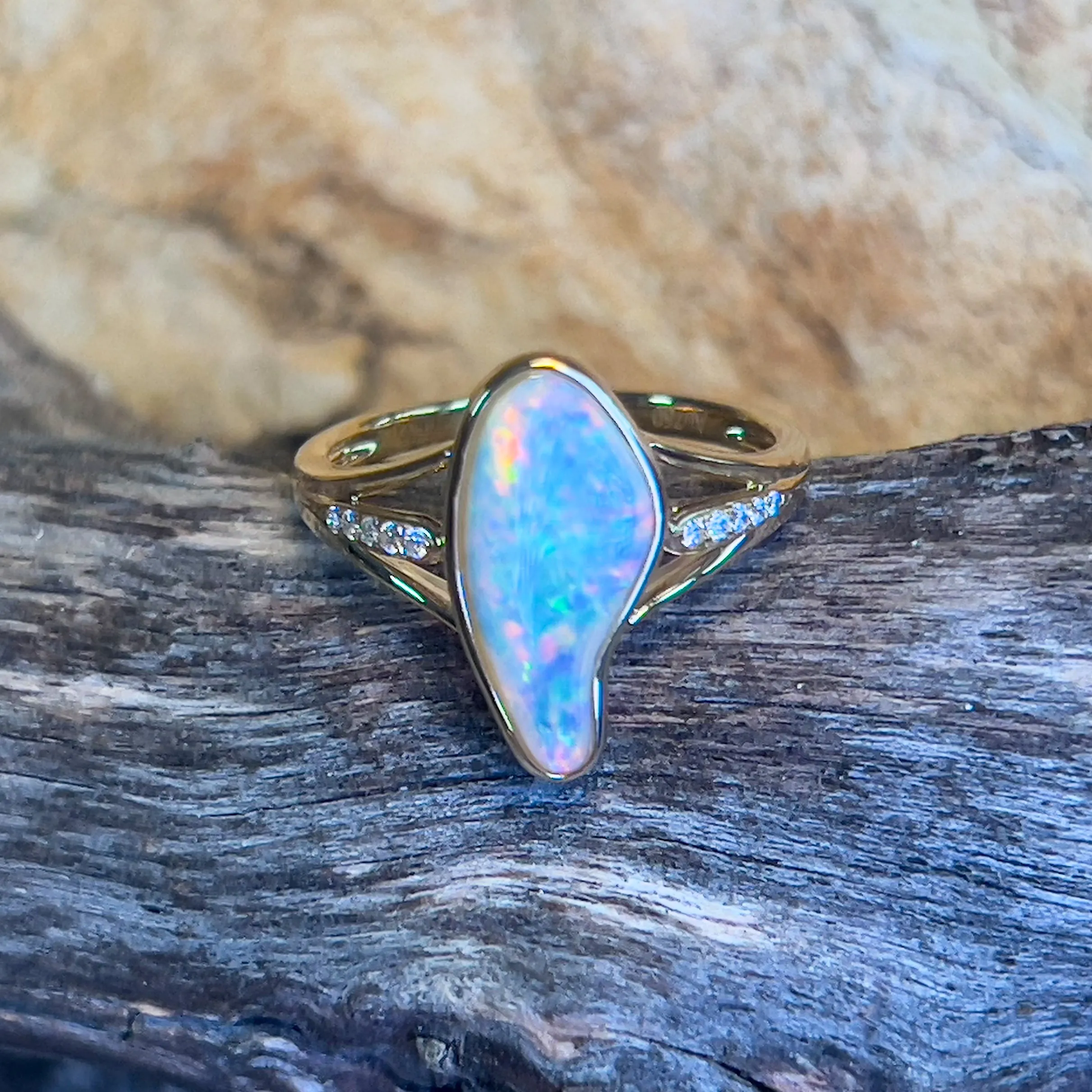 18kt Yellow gold 1.1ct freeform Opal and diamond ring