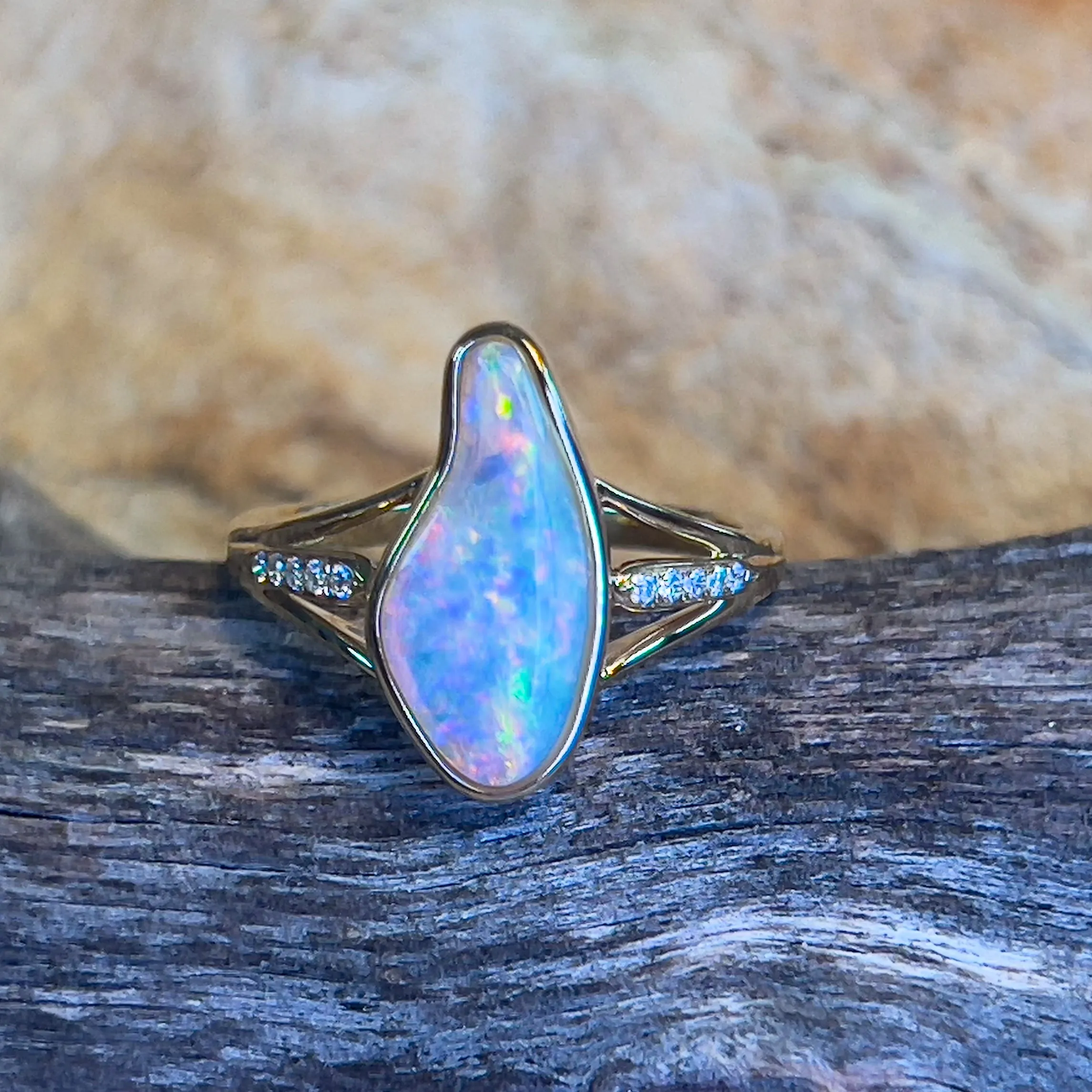 18kt Yellow gold 1.1ct freeform Opal and diamond ring