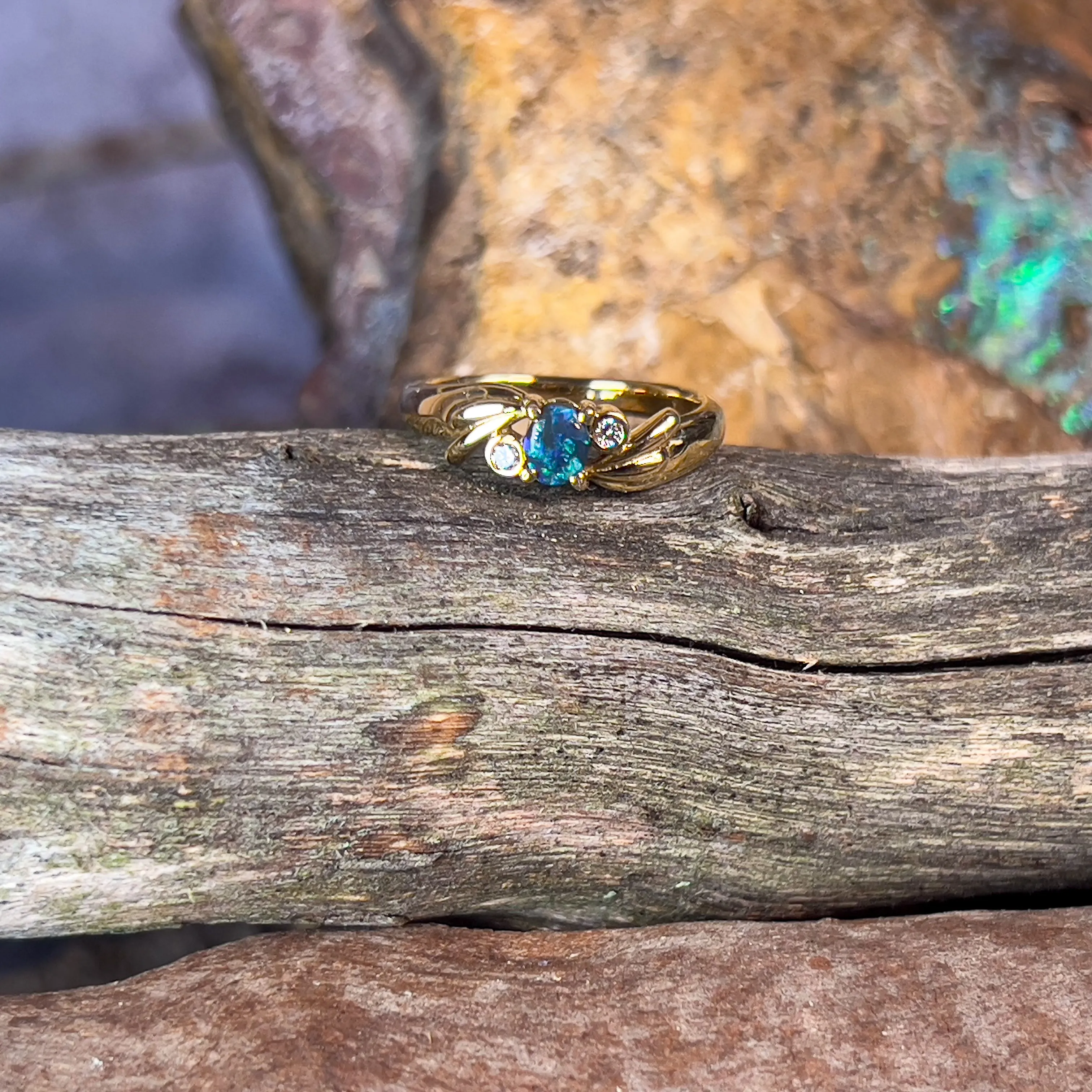 18kt Yellow Gold Black Opal 0.15 and Diamond ring