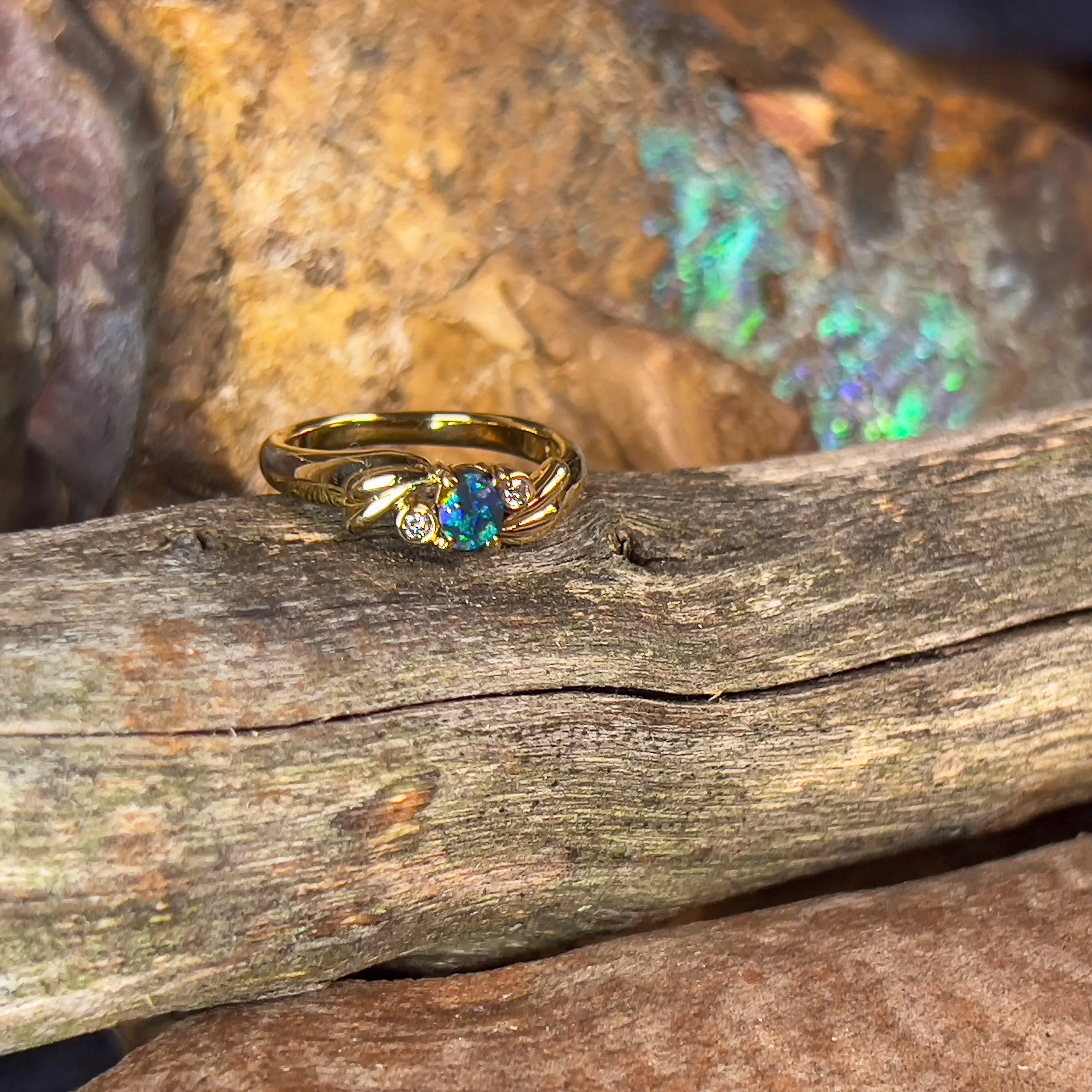 18kt Yellow Gold Black Opal 0.15 and Diamond ring