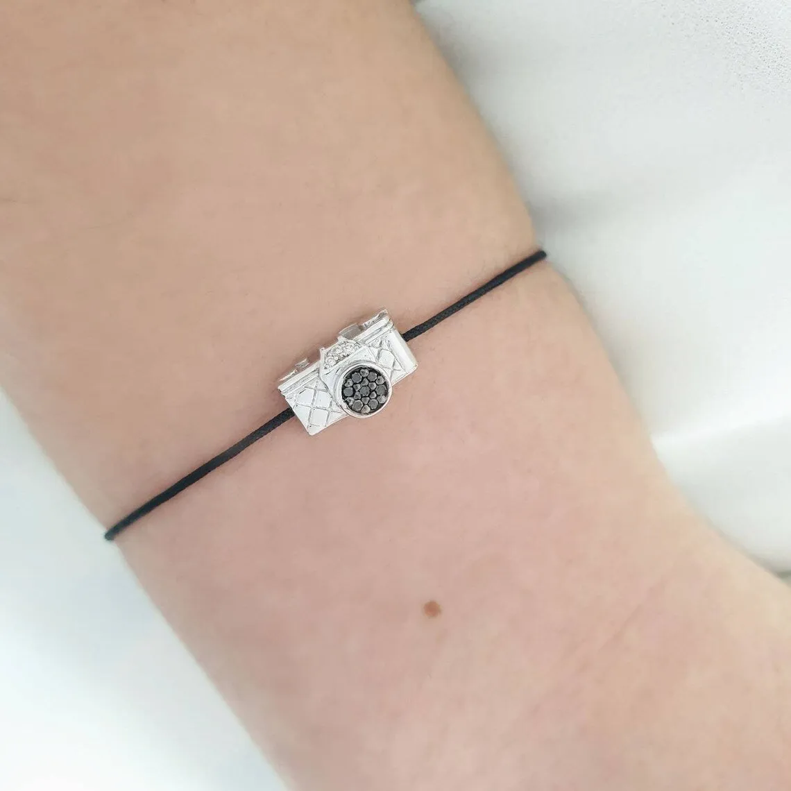 Camera Bracelet With Black and White Diamonds