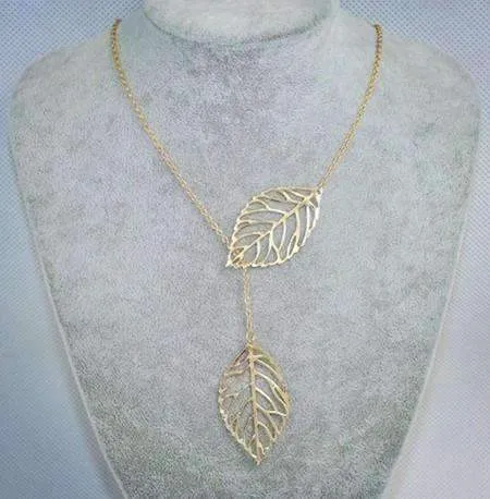 Seasons of Beauty Leaf Cut Out Necklace or Earrings for Woman