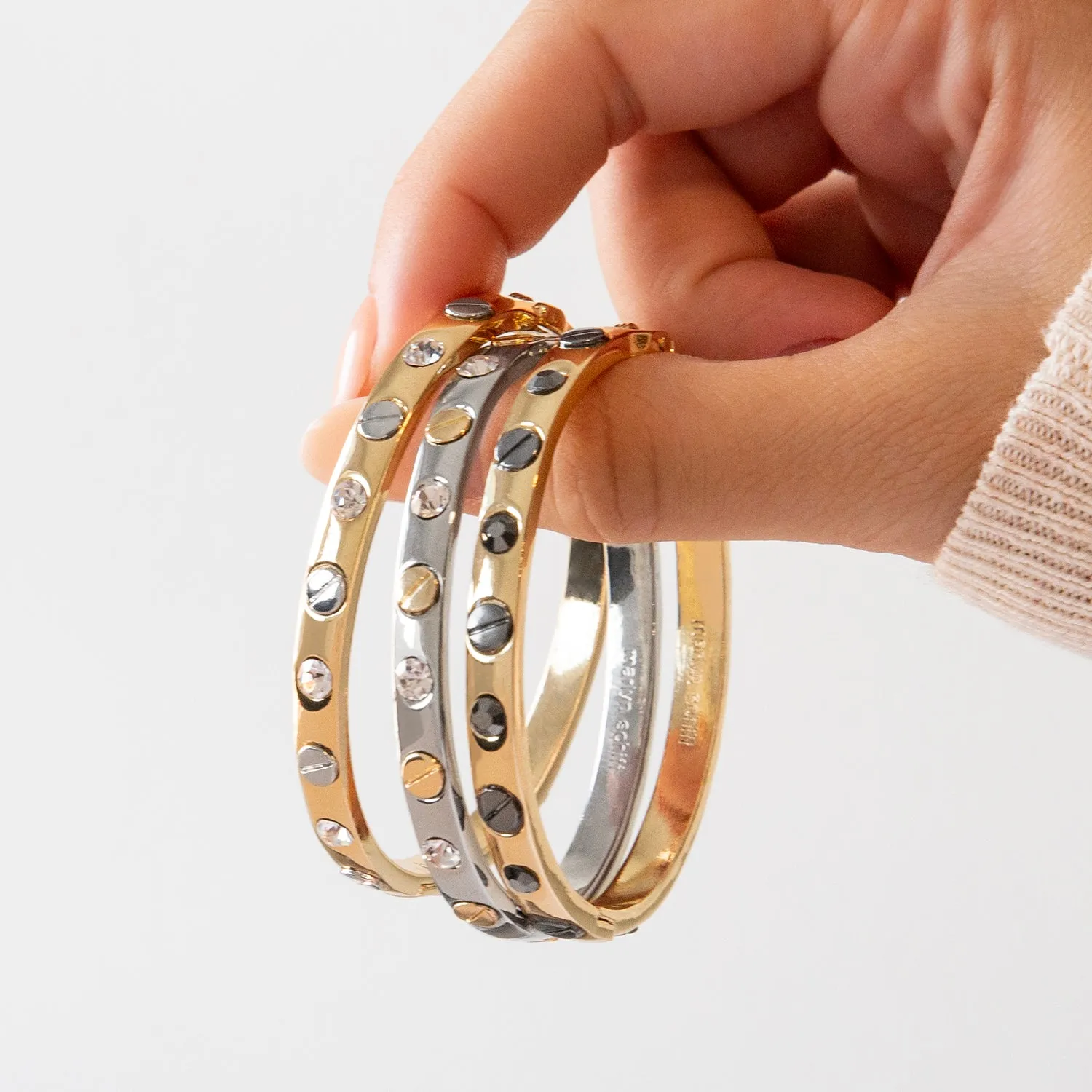 shiny metal nailhead bangle