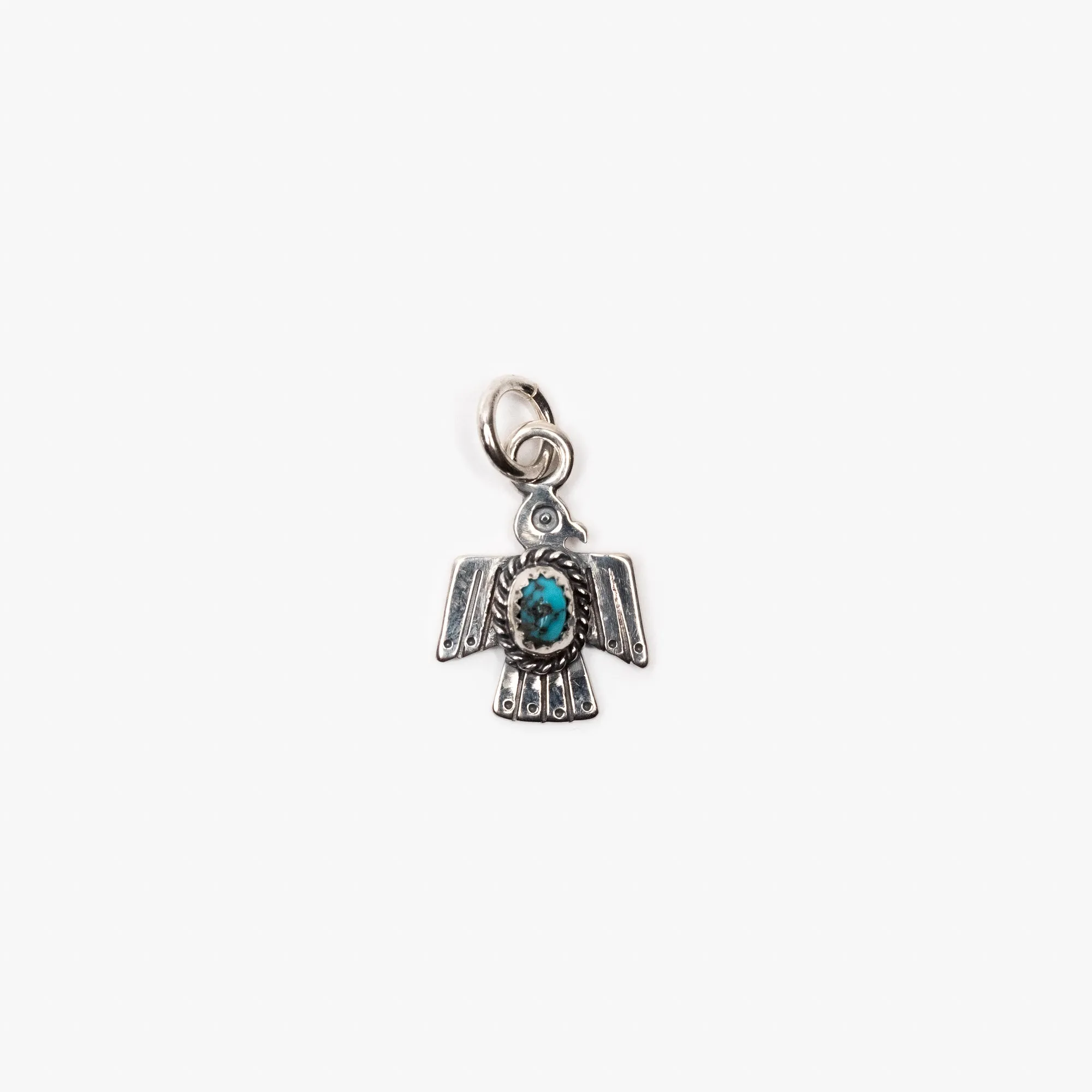 The Flat Head Thunderbird Pendant with Turquoise